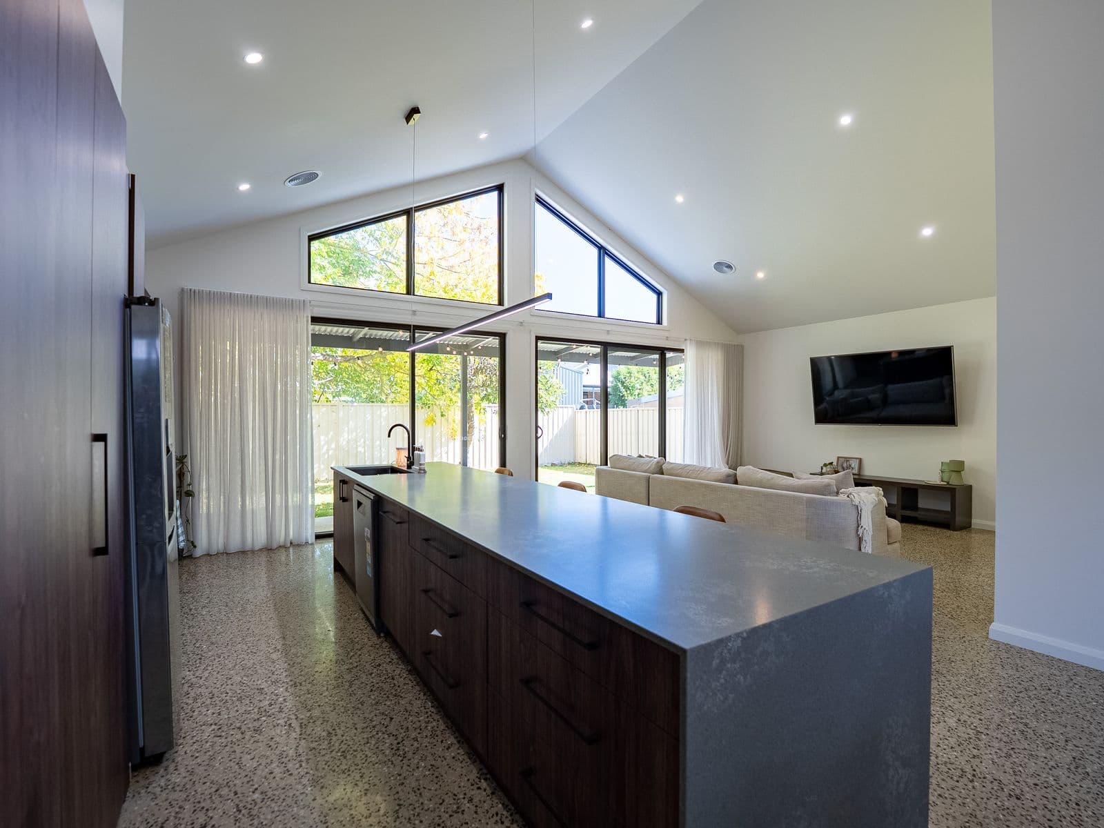 Patten & Grant build — open-plan living with vaulted ceilings